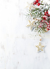 Vintage christmas decoration on white painted wooden background

