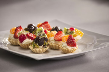 Fresh Homemade Fruit Tart with berries and kiwi