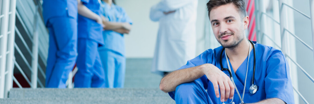 Young doctor sitting in hospital