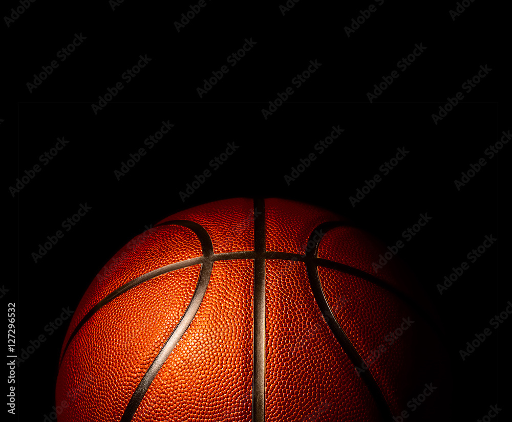 Wall mural basketball on black background.