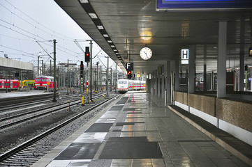 the station, the train arrives at the platform. None
