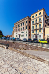 Fototapeta premium Shopping street of the old city with ancient houses, Corfu