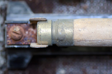 Old rusty electrical fuses with terminals