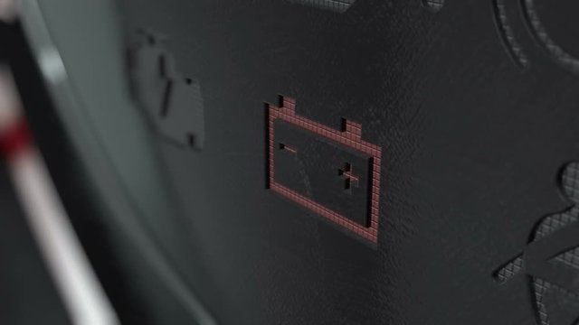 An extreme closeup of a blinking brake dashboard light on an dashboard panel background