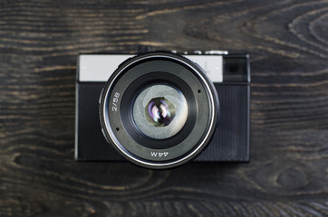 camera lenses on a wooden background