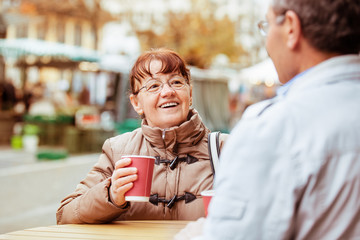 Senior couple enjoying coffee.