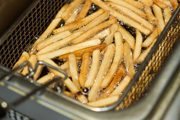 the process of frying French fries