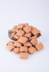 cookie or biscuits filled with chocolate cream on a background.