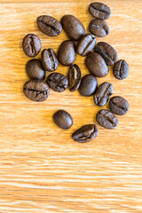 coffee beans on a wood floor.