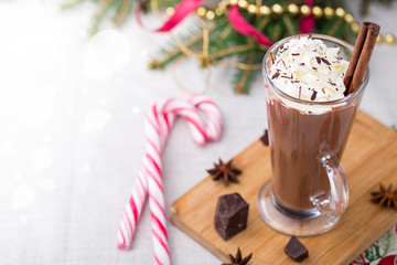 Hot chocolate with whipped cream. Christmas table.