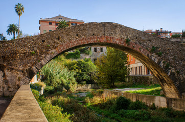 Obraz premium Ponte Romano, an old roman bridge in Genoa Nervi, which in ancient times has been a part of Via Aurelia, an important road connecting towns in Roman empire