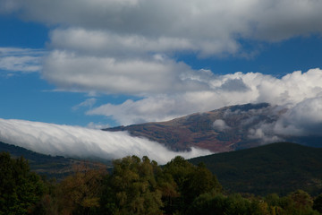 misty and cloudy autumn high in the mountains.