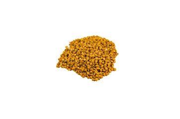 Pile of buckwheat seeds isolated on white background