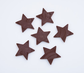 Chocolate or chocolate star on a background.