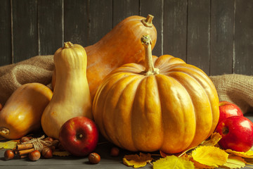 pumpkins on wooden board
