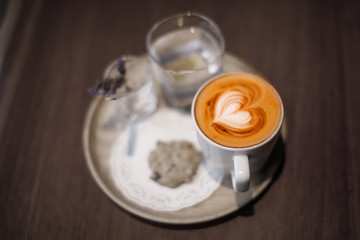 Obraz na płótnie Canvas Heart on hot coffee, Cappuccino coffee hot.