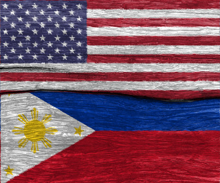 USA flag and philippines flag on wood texture background floor - can use to display or montage on product