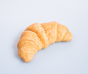 croissant or tasty croissant on the background.