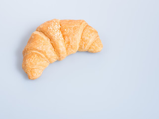 croissant or tasty croissant on the background.