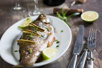 Baked trout with lime and white wine