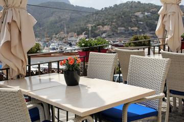 empty table in a restaurant in Port de Soller, Majorca, Spain. 