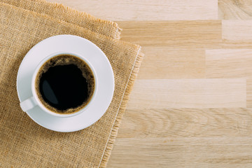Coffee cup on wooden table