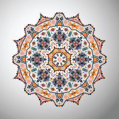Ornamental round colorful geometric pattern in aztec style