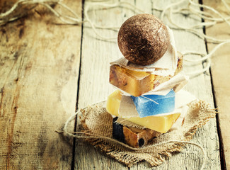 Natural soap on a vintage wooden background, selective focus