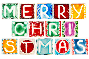 Words MERRY CHRISTMAS made from ceramic letters