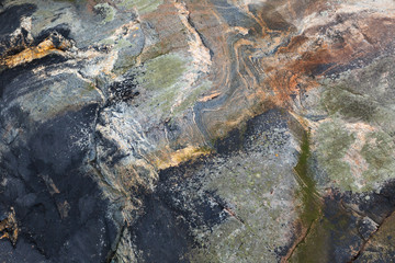 Wet coastal stone background texture