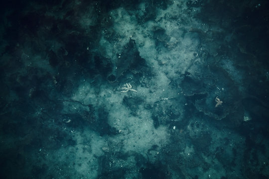 Ocean seabed background. Dark blue