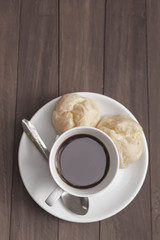 cup of coffee on the wooden table