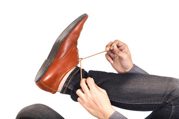 Man wearing leather shoes.