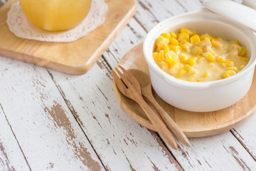 Corn soup in white bowl