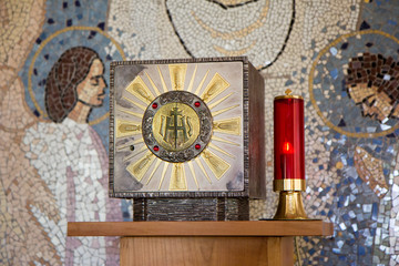 Medjugorje, Bosnia and Herzegovina 2016/11/13. Tabernacle with Eucharist and a sanctuary candle lamp in a chapel in Majcino selo (Mother's village).