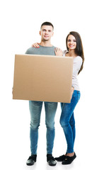 Fototapeta na wymiar Young couple moving into a new home