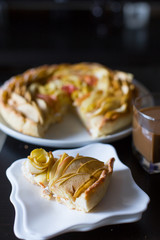 Apple homemade cake in the form of beautiful roses cofee yellow