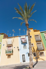 Fototapeta premium Row of pastel colored terrace style traditional Mediterranean homes