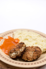 Meatballs with tomato sauce on the plate