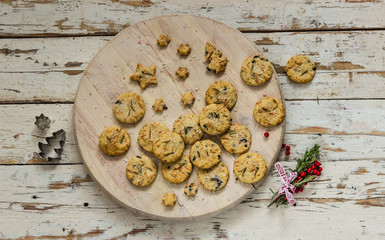 dry salted crackers on wooden plate with rosemary