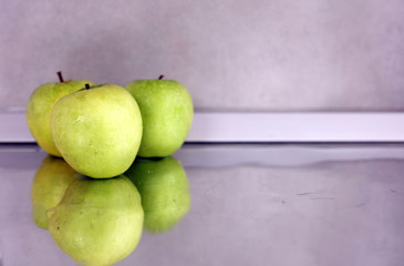 Apples on kitchen work table. Health care, medical and healthy life style concept