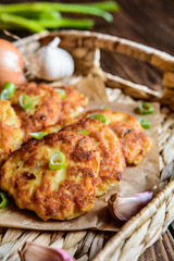 Fried tuna pancakes with potato, onion and garlic