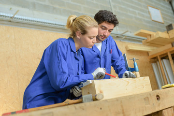 workers in carpentry workshop