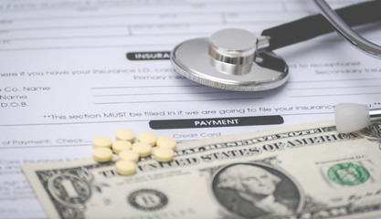 Close-up of patient information PAYMENT concept,Stetoscope and m