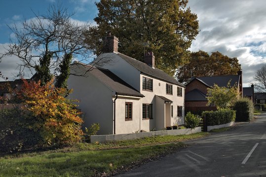 View on an entrance area of english house. White residential bui