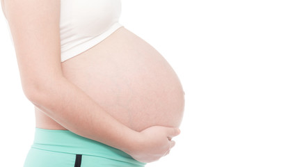 Pregnant woman holding her belly isolate on white background