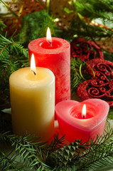 New Year and Christmas background with candles decorated Christmas tree