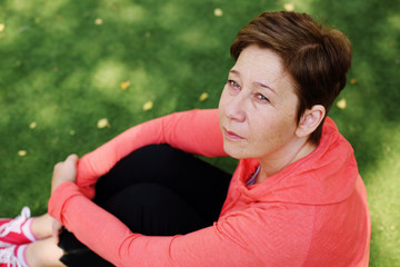 Portrait of beautiful 45 years old woman outdoors