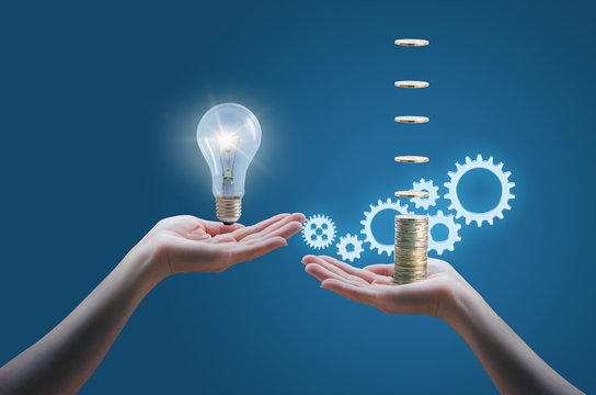 Hand holds money, hand holds light bulb. Buy idea, investing in innovation, modern technology business concept