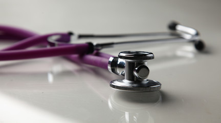 Closeup of a medical stethoscope, isolated on white background
